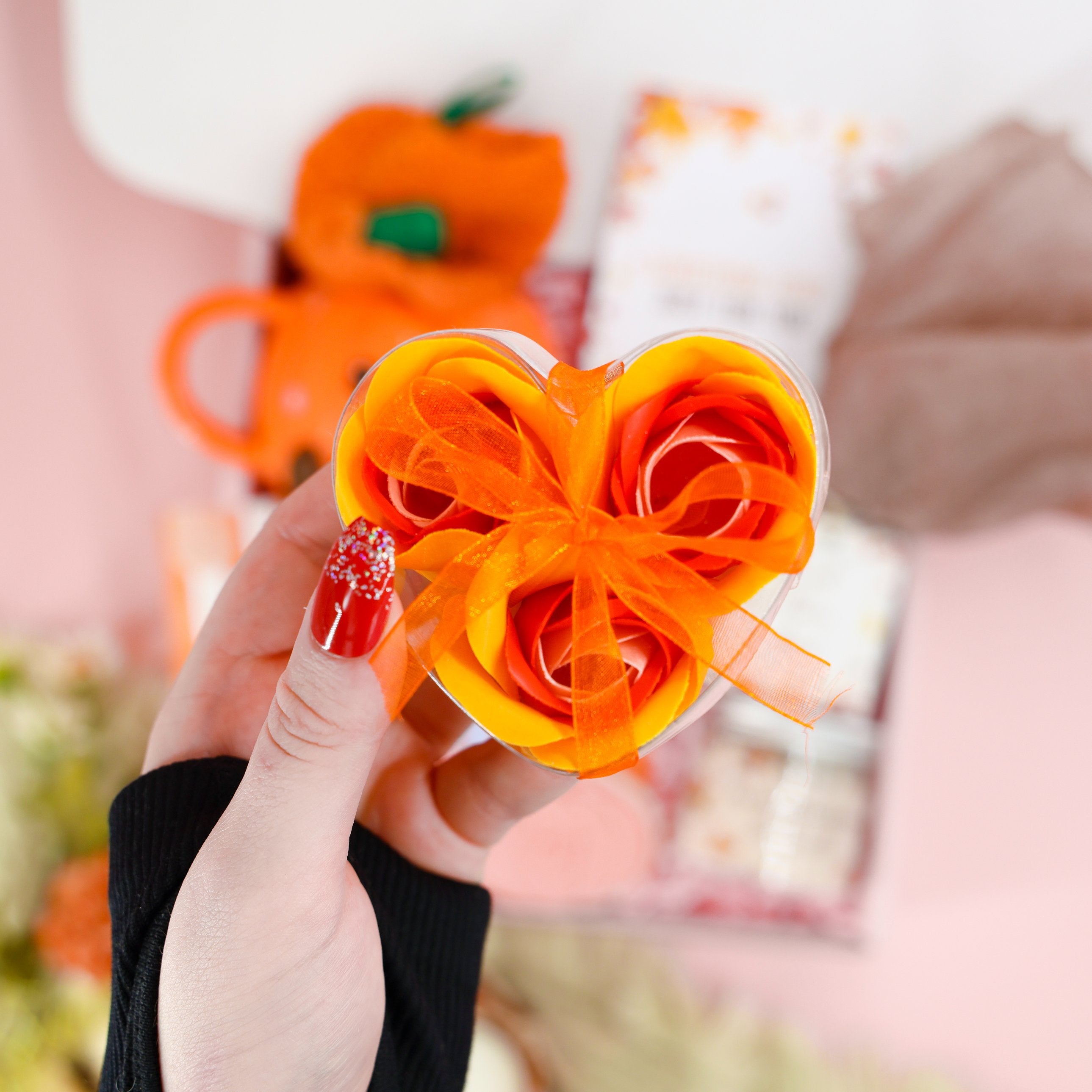 Autumn gifts for her – seasonal gift set with pumpkin mug, fluffy socks, and pampering items