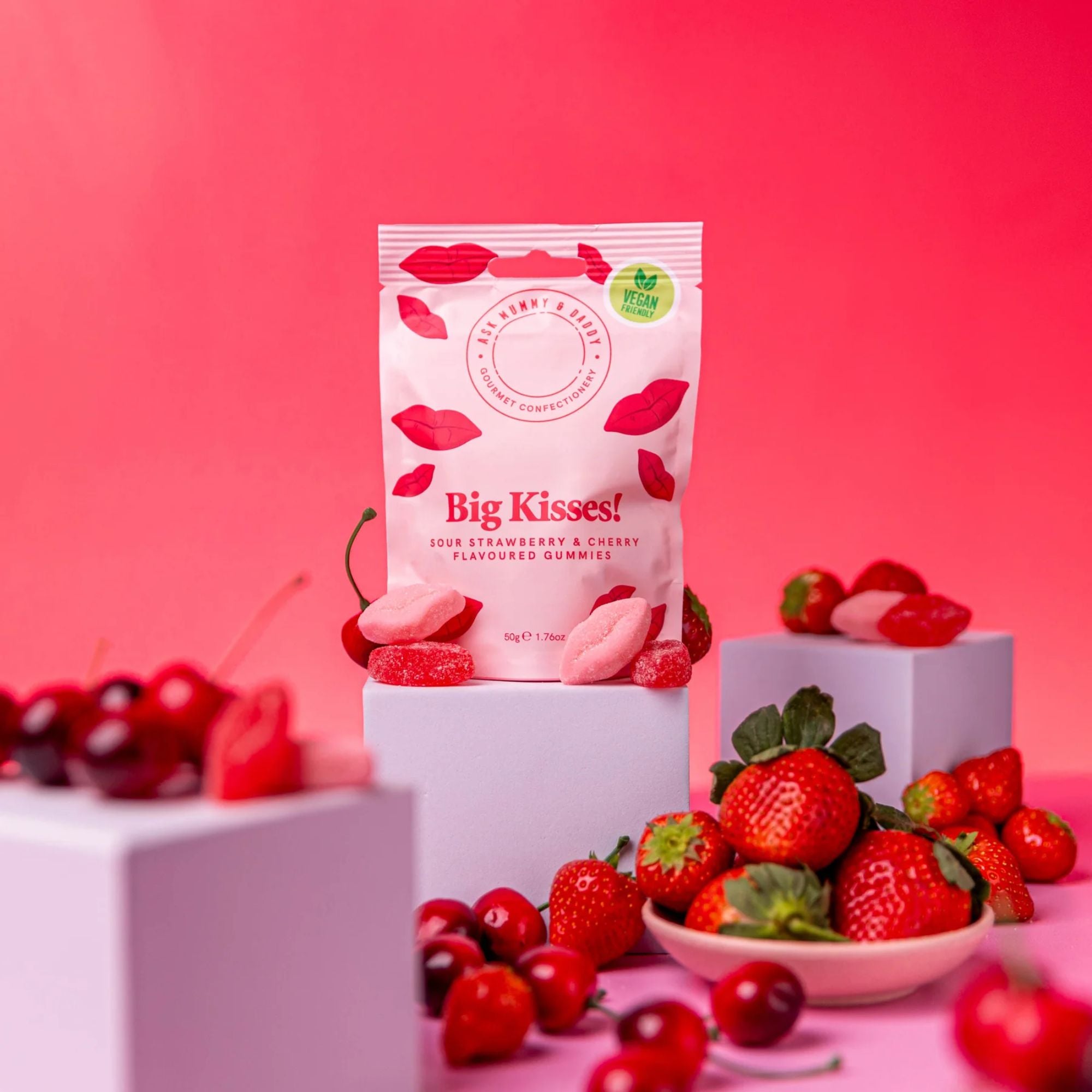 Big Kisses Gummies, featuring lip-shaped, fizzy vegan treats, embodying sweet strawberry essence. Ideal for indulging or sharing, offering a delightful balance of flavor.
