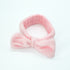 Bowknot Headband Pink: A plush headband with a stylish bowknot, ideal for securing hair during beauty routines, blending functionality with charm.