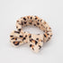 Leopard Print Bowknot Headband: A plush, versatile fashion accessory ideal for securing hair during beauty routines, combining functionality with a cute, stylish flair.