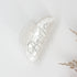 Bride Pearl Hair Clip: A glossy white hair clip with rhinestones spelling Bride, featuring an oversized claw design for elegant bridal or celebratory hairstyles.