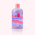 Bubble T Blueberry Dragon Bath & Shower Gel bottle close-up, featuring a pink cap, ribbon, and logo, highlighting its luxurious, fruity cleansing experience.