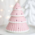 Christmas Tree Oil Burner with star cut-outs, serving as a stylish ornament. Use with diluted fragrance oil, lid removed, for festive home ambiance.