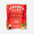 Christmas Pudding Popcorn, a festive snack blend of popped corn, sugar, and spices, showcasing its label and a pile of popcorn on a white surface.