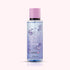 Coconut Miracle Body Mist bottle with text, showcasing a tropical vibe. Ideal for daily use, it features coconut and vanilla for a refreshing, uplifting scent.
