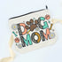 Dog Mom Pouch with cartoon florals and paw prints, ideal for makeup or treats, crafted from durable canvas, perfect for dog lovers.