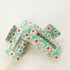 Flower Print Hair Clip showcasing a stylish floral pattern, perfect for an elegant hairstyle with secure grip, ideal for chic hair styling.