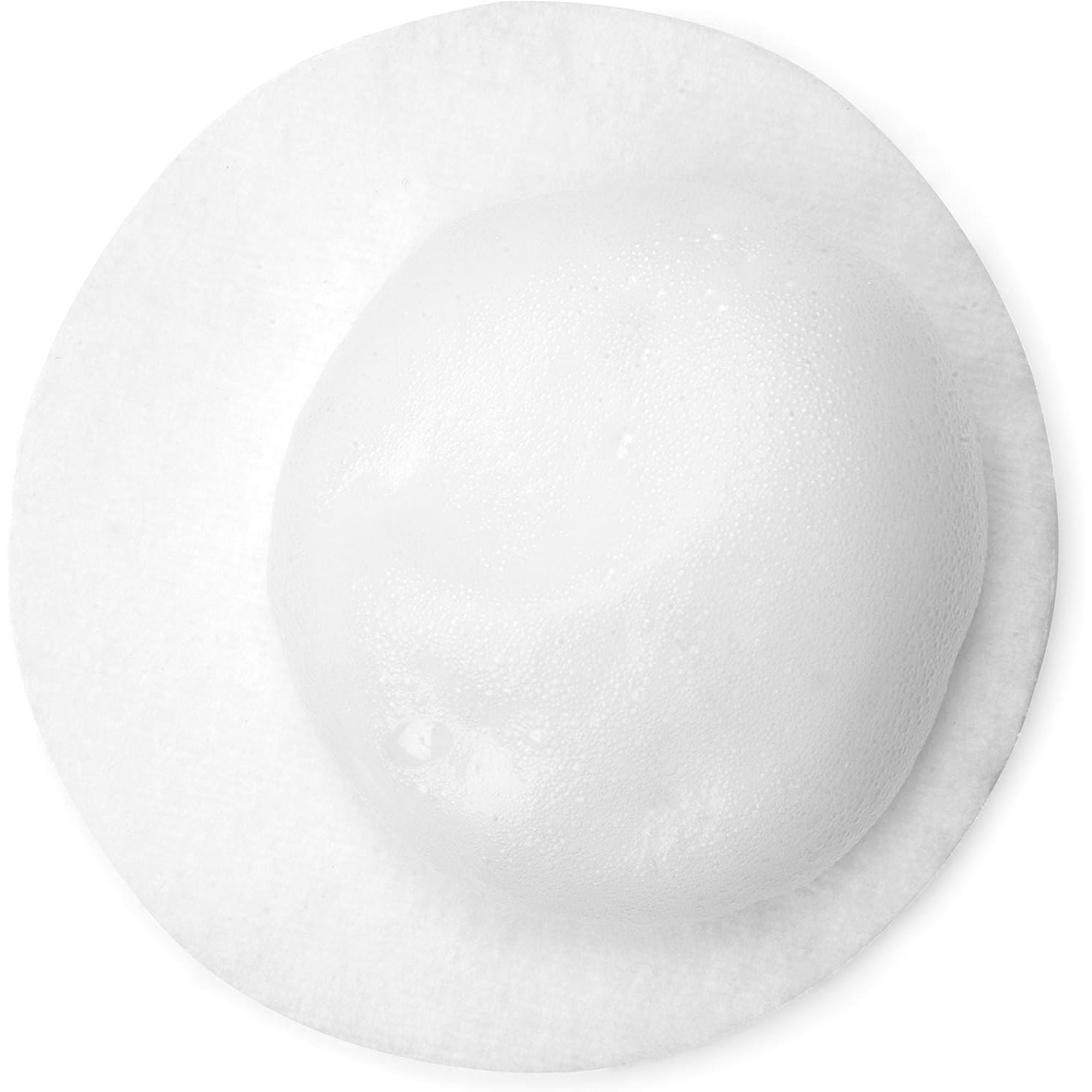 Foaming Micellar Cleansing Water in a white bottle with black text, featuring soothing rose water and nourishing argan oil for gentle makeup removal.