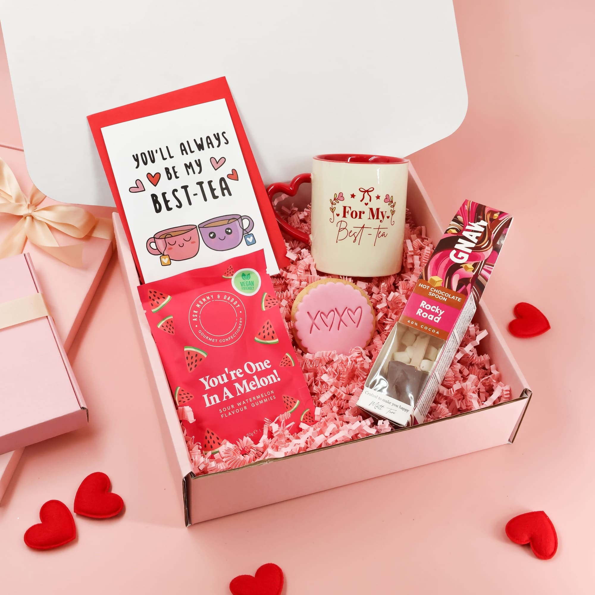 Galentines gift for her featuring bestie mug, fruity gummies and Valentine biscuit