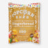 Gingerbread Popcorn: Close-up of caramel-drizzled popcorn, infused with gingerbread spices, evoking a festive taste and aroma, perfect as a holiday snack.