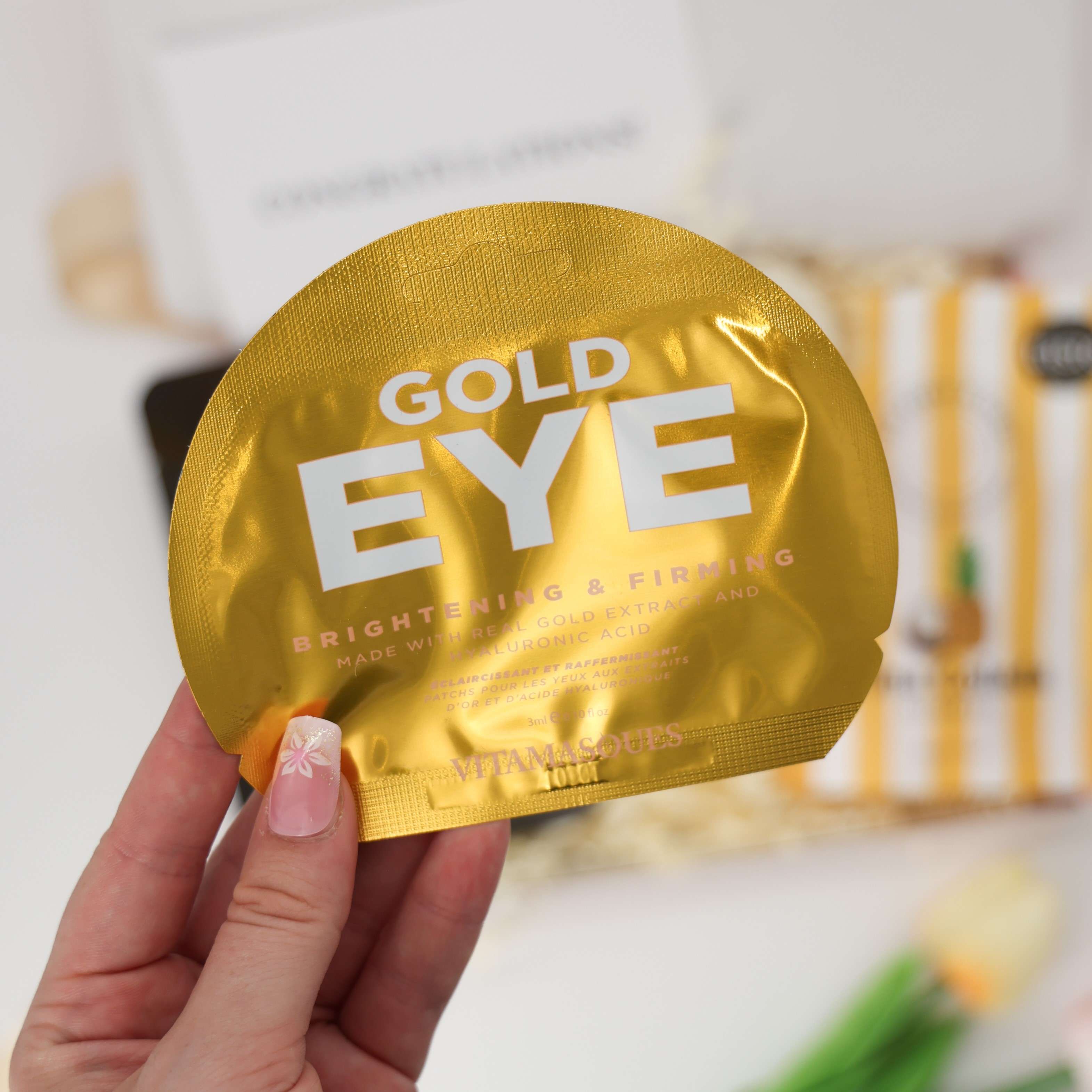 Self care gifts for graduates – piña colada gummies and gold eye mask
