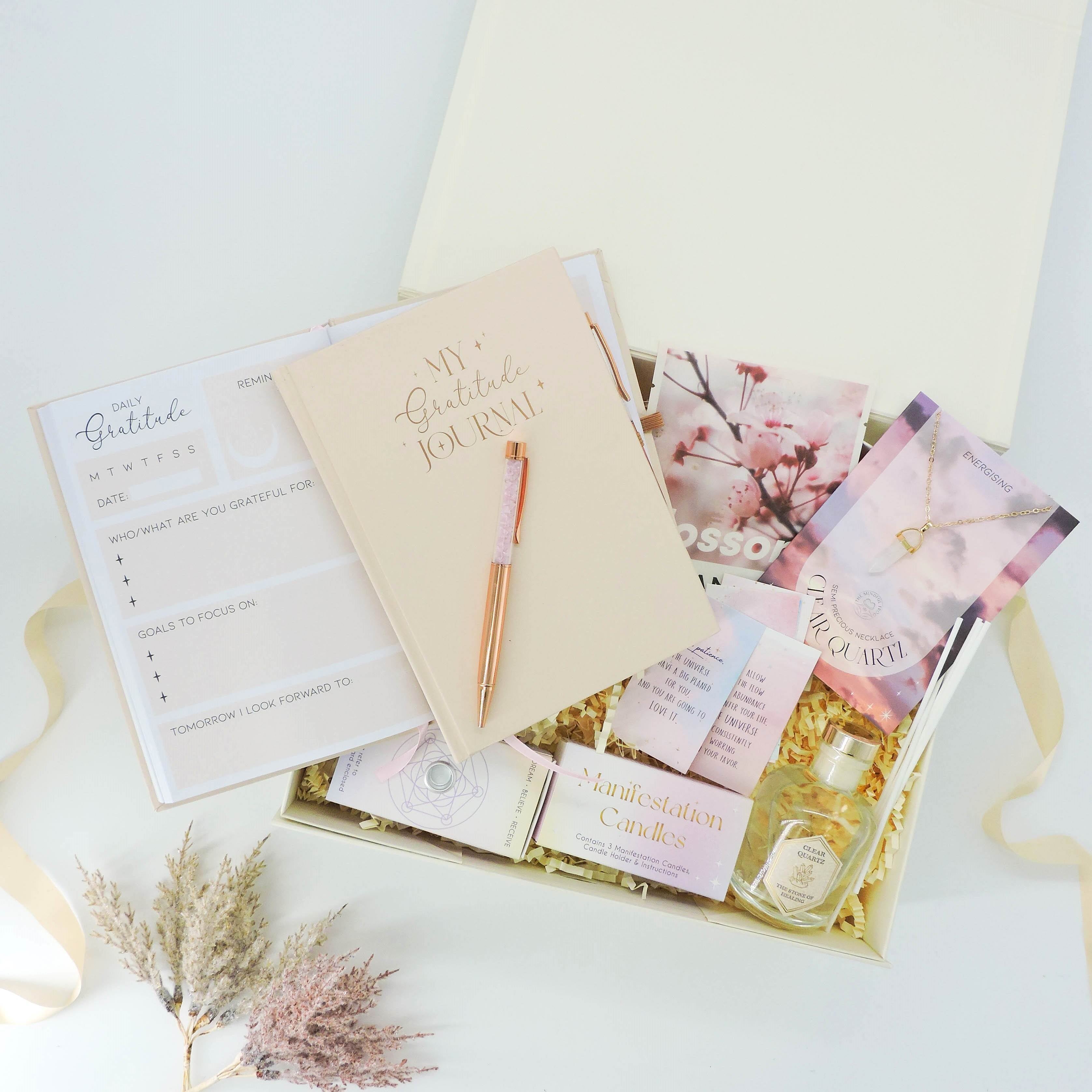 Gratitude & Manifestation Box – wellness gifts with a blush journal, crystal necklace, and manifestation candles