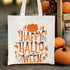 Happy Halloween Tote Bag with vibrant pumpkin design, fall leaves, and spiderweb accents. Perfect for carrying Halloween essentials. Size: 59cm x 34cm.