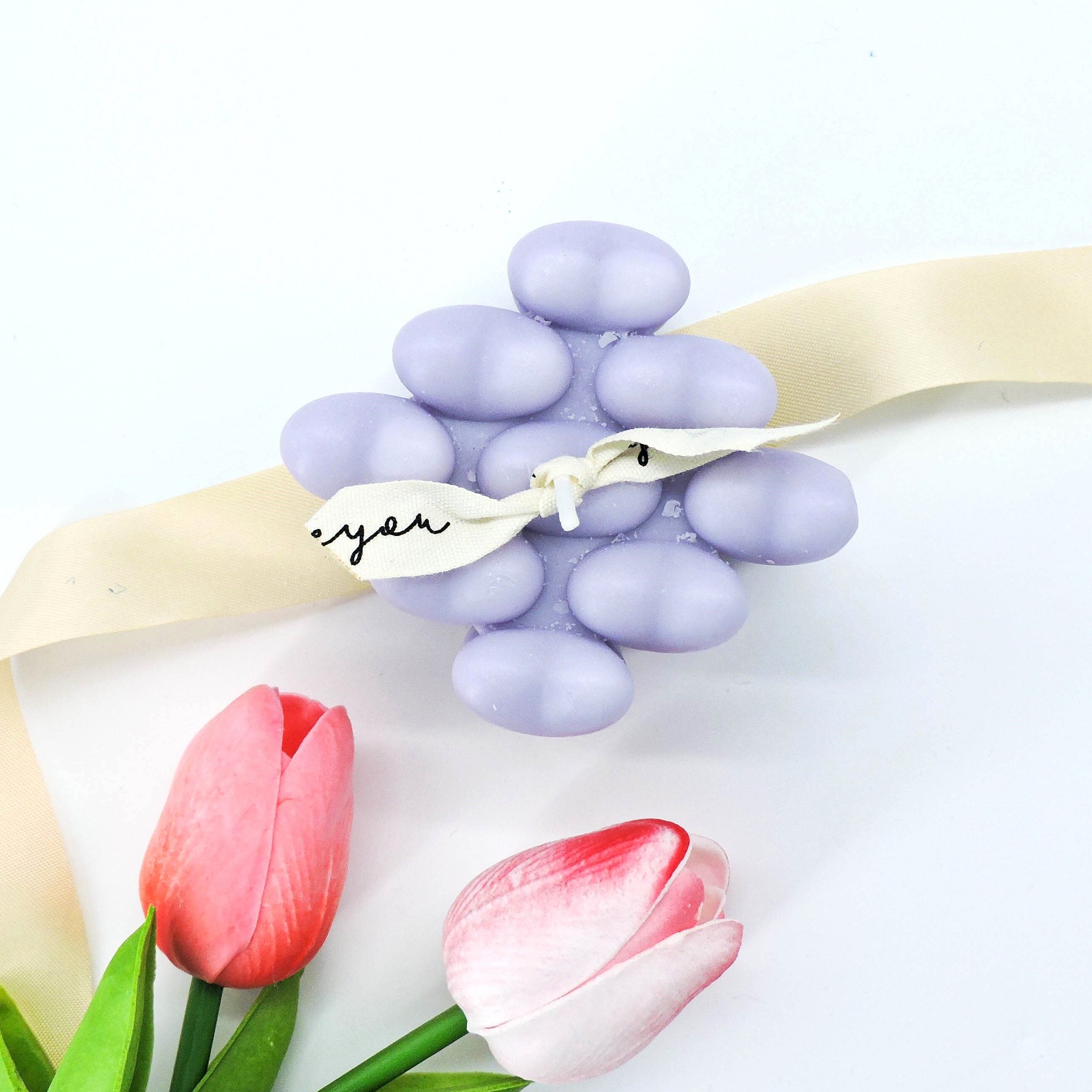 Luxury Mini Hearts Candle – Purple: Close-up of a uniquely designed bubble heart candle, perfect for creating a calming indoor atmosphere with its soft glow.