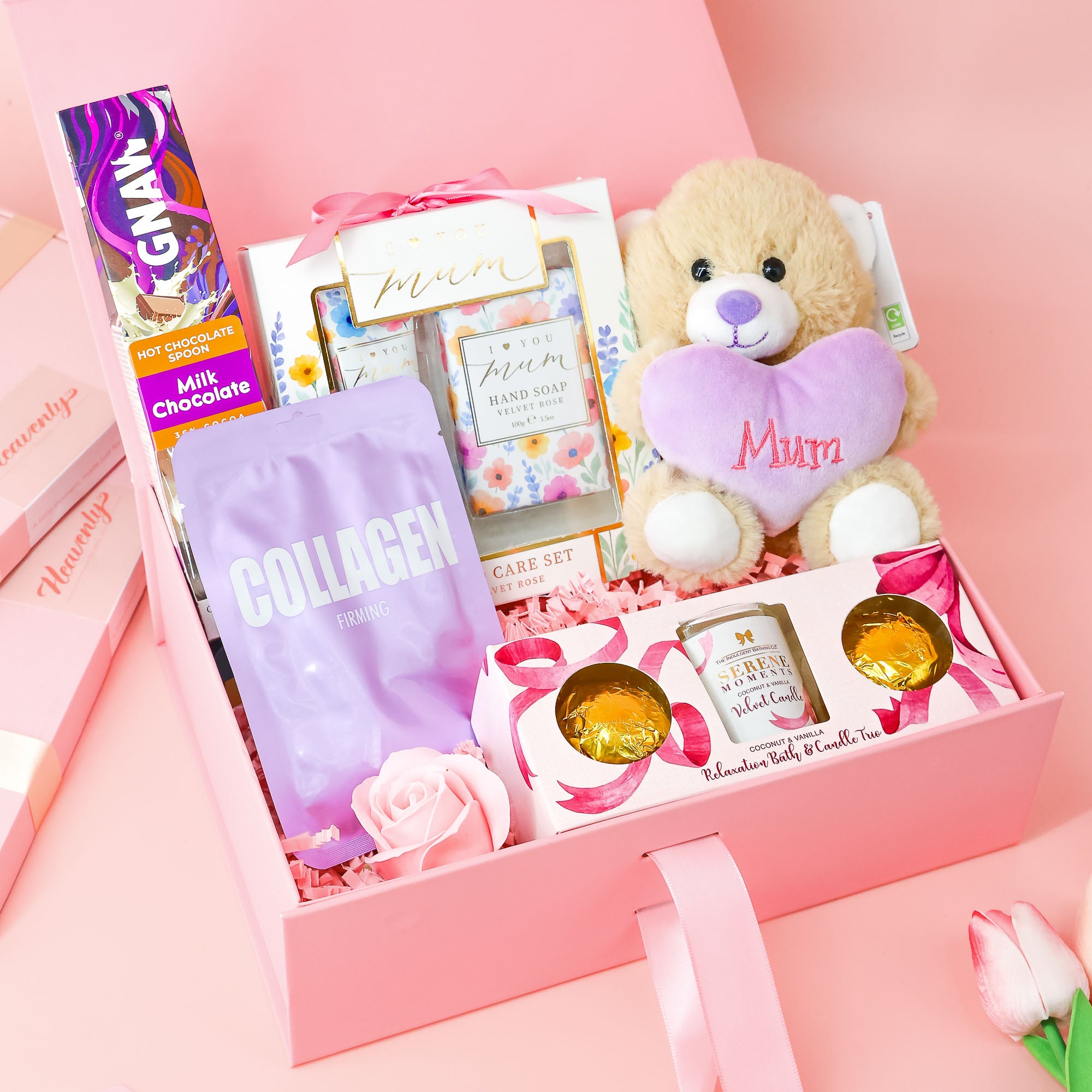 Pink gift box for mum with teddy bear, skincare, candle and sweet treats