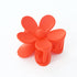 Orange Matte Flower Large Hair Clip, featuring a bold flower design, adds vibrant charm and playfulness to hairstyles, perfect for stylish daily wear or gifting.