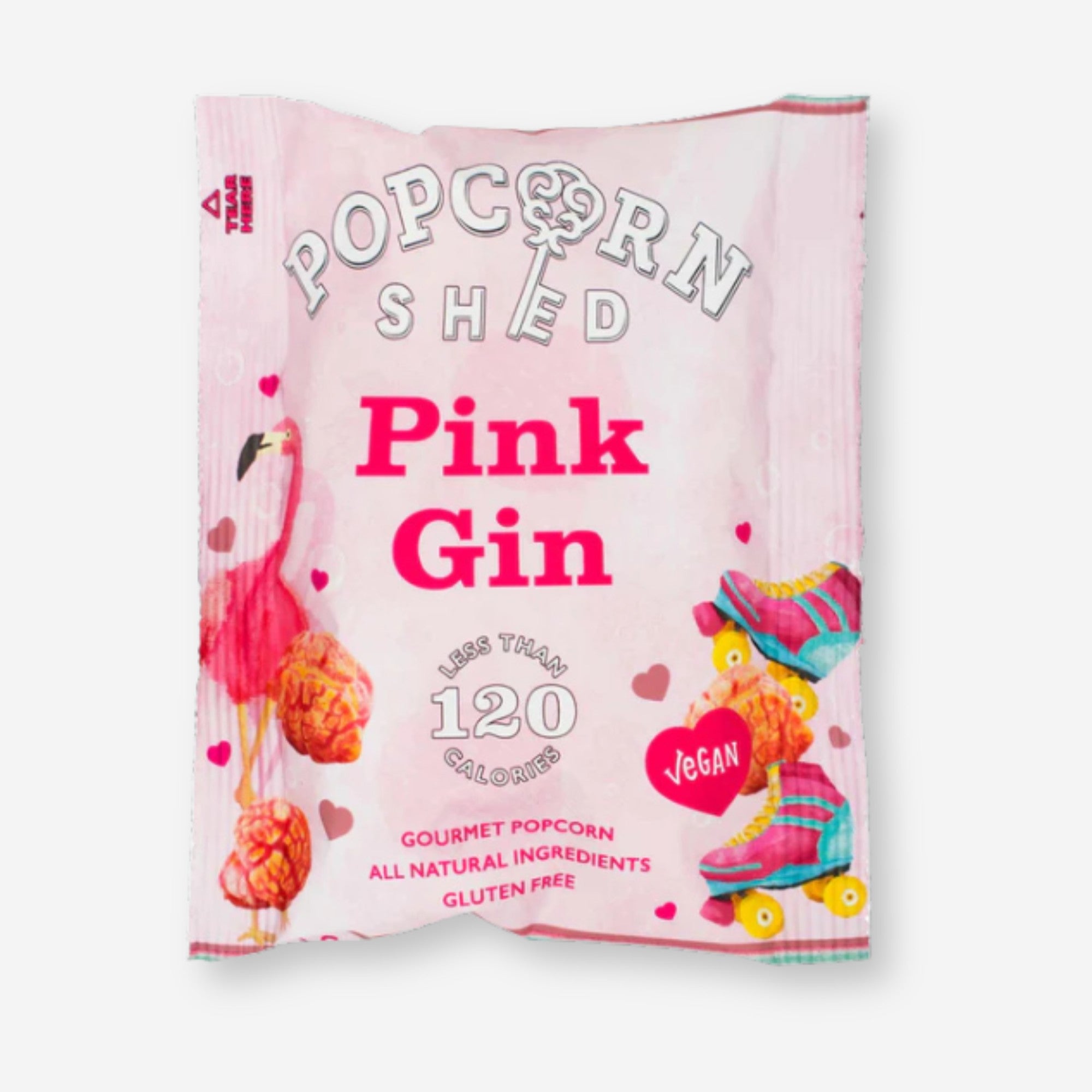 Pink Gin Popcorn next to a bowl, highlighting crunchy air-popped corn with raspberry and lime-infused caramel, capturing a unique gin and tonic flavor experience.