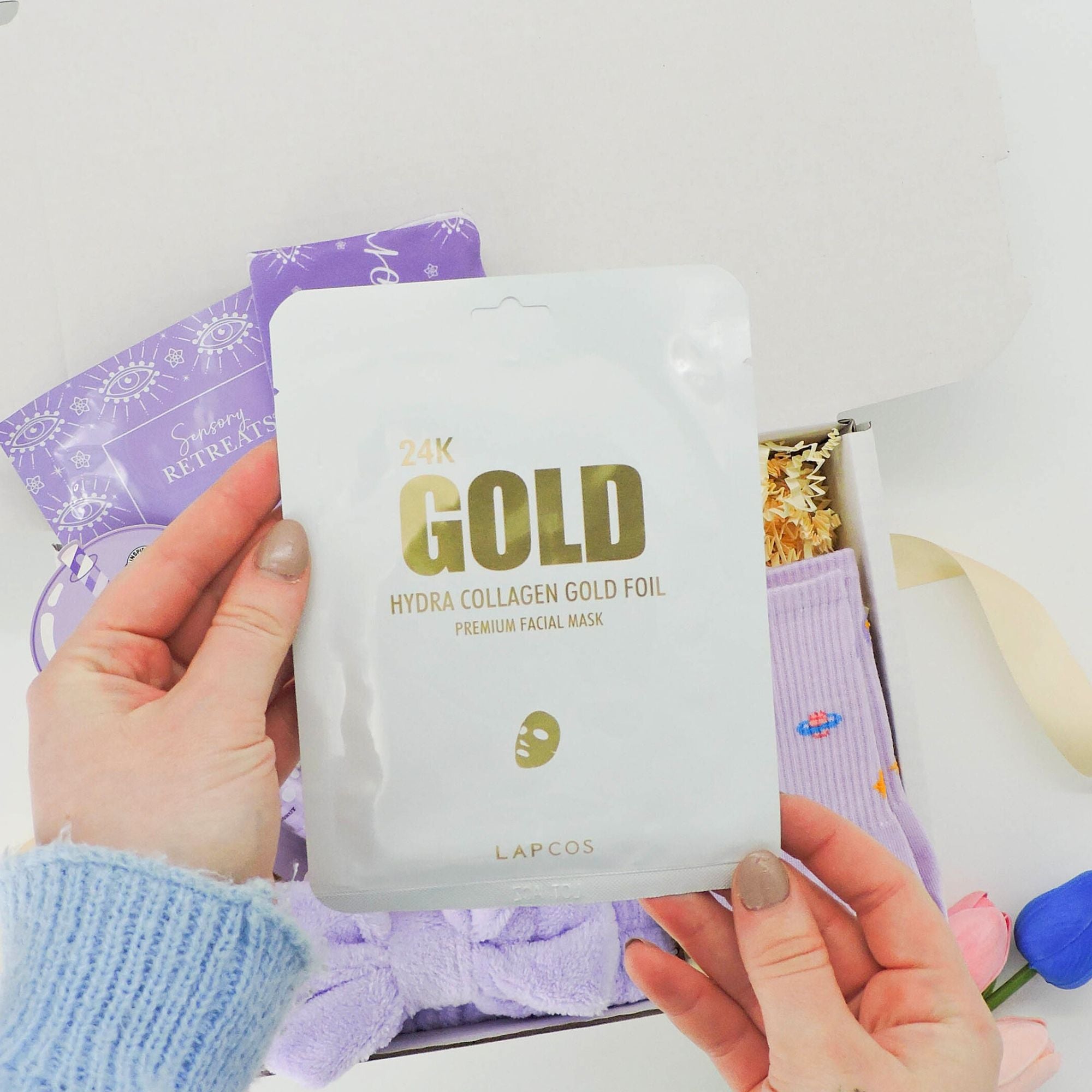 Self care gifts – Sending Hugs box with space-themed socks and a &