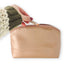 Close-up of the Rose Gold Cosmetic Bag, showcasing its durable material and smooth zipper, designed for storing beauty essentials stylishly and practically.
