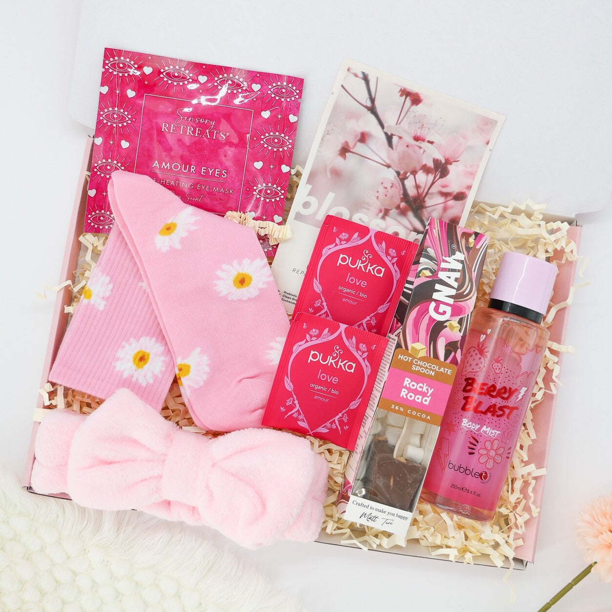 Self care gifts – Rosy Moments box featuring eye masks, hot chocolate, and relaxing bath essentials