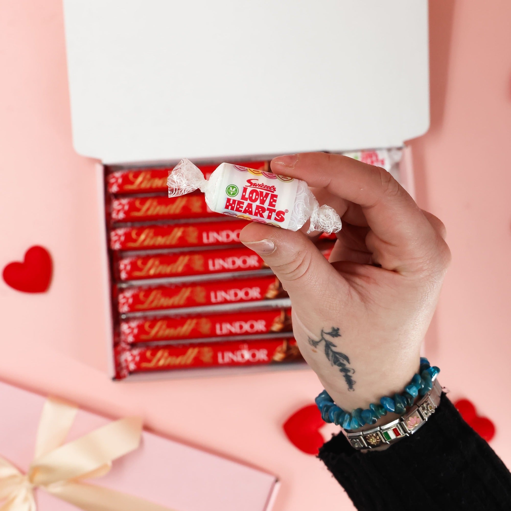 Valentines gift chocolate box with smooth milk chocolate bars and classic love hearts