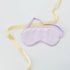 Purple Silk Eye Mask - Rest in Style: Soft silk eye mask with elegant design, featuring a delicate yellow ribbon, ideal for blocking light gently.