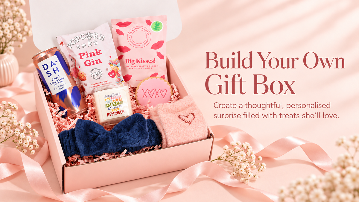 Build your own gift box with Heavenly Boxes UK, featuring a pink gift box filled with sweet treats, self-care goodies and thoughtful gifts.