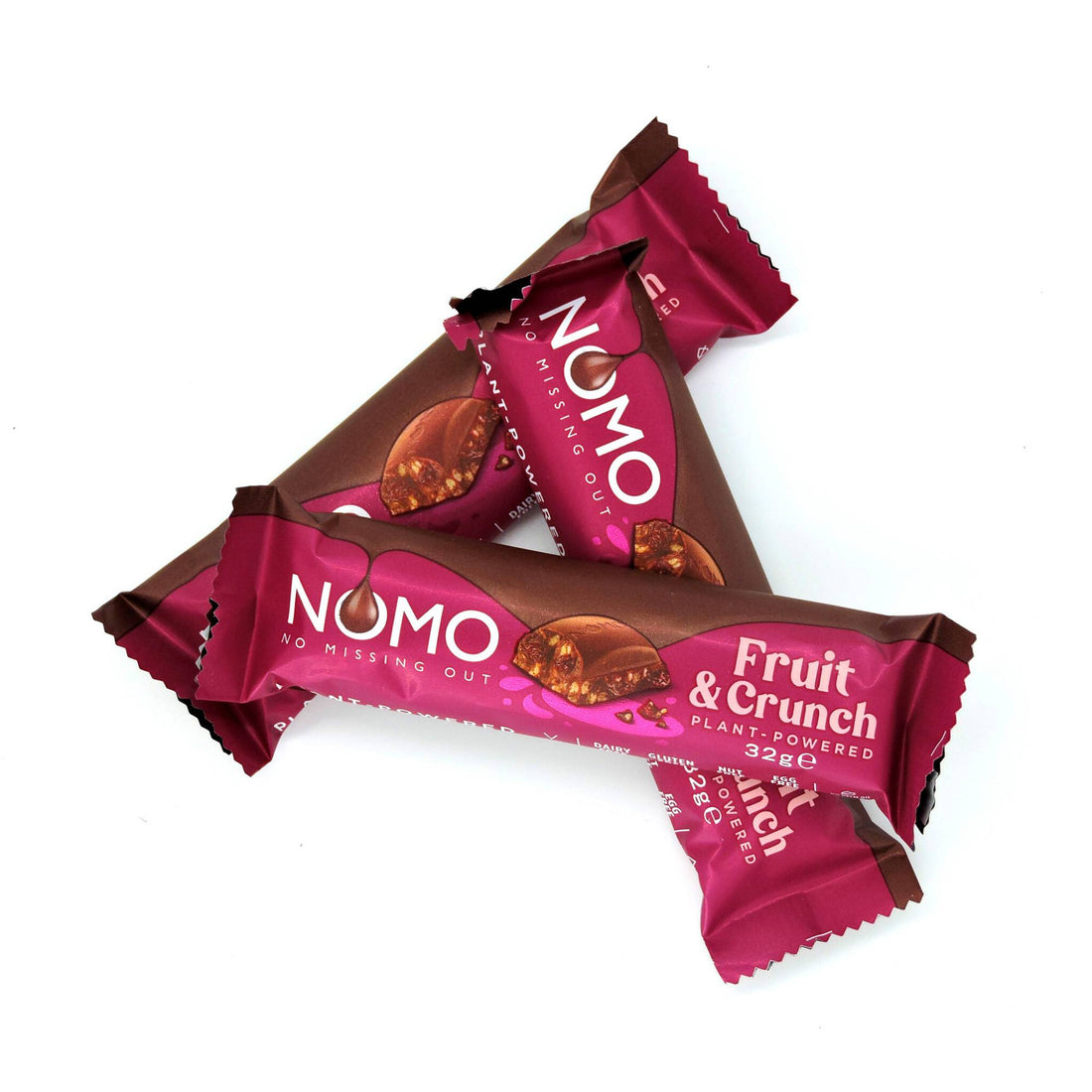 NOMO Fruit &amp; Crunch Choc Bar close-up, highlighting the pink label and texture, showcasing its vegan, dairy-free, gluten-free, nut-free attributes for an allergen-friendly treat.