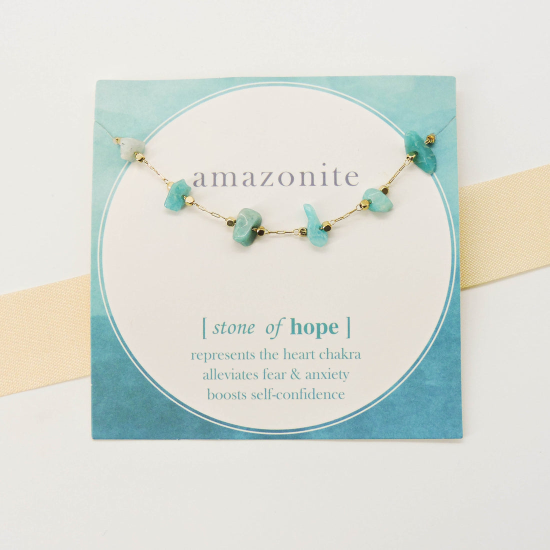 Close-up of the Amazonite Stone of Hope Bracelet featuring raw amazonite chips on a gold-tone chain, symbolizing balance and inner peace.