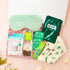 A Moment for Me self-care gift box – soothing green-themed gift for her with socks, mint tea, calming face mask, sweets, hot chocolate and eye mask.