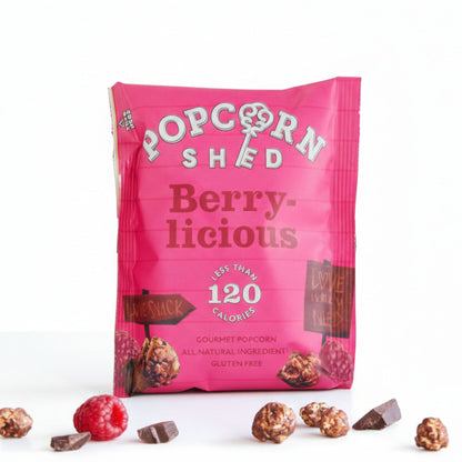 Berrylicious popcorn shed bag with chocolate coated popcorn pieces and raspberries