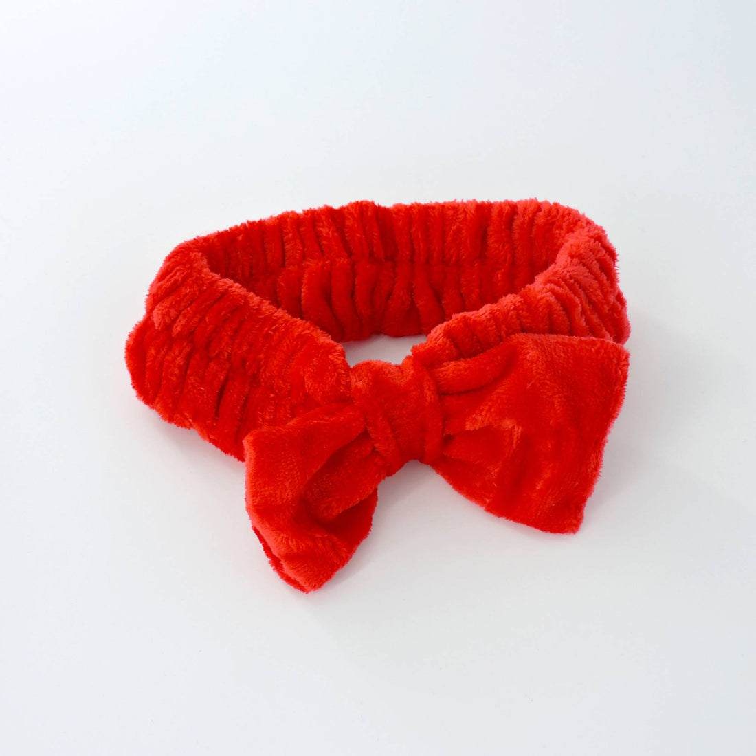 Bowknot Headband Red: Plush headband with a stylish bow, ideal for keeping hair back during skincare routines. Perfect for gifting and adding flair.