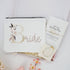 A Little Gift for the Bride | Bride To Be Gifts set with a floral pouch, pearl bracelet, and message card, elegantly arranged with floral accents.
