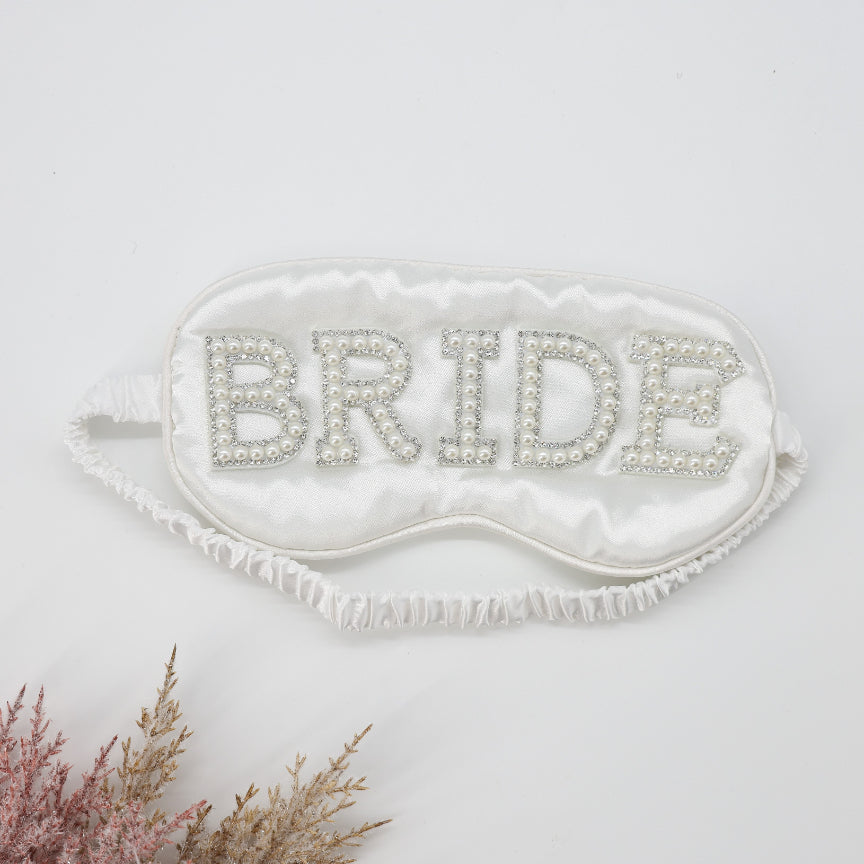 Bride Satin Sleep Mask adorned with sparkling rhinestones, elegantly designed for bridal moments, enhancing beauty and style during wedding preparations.