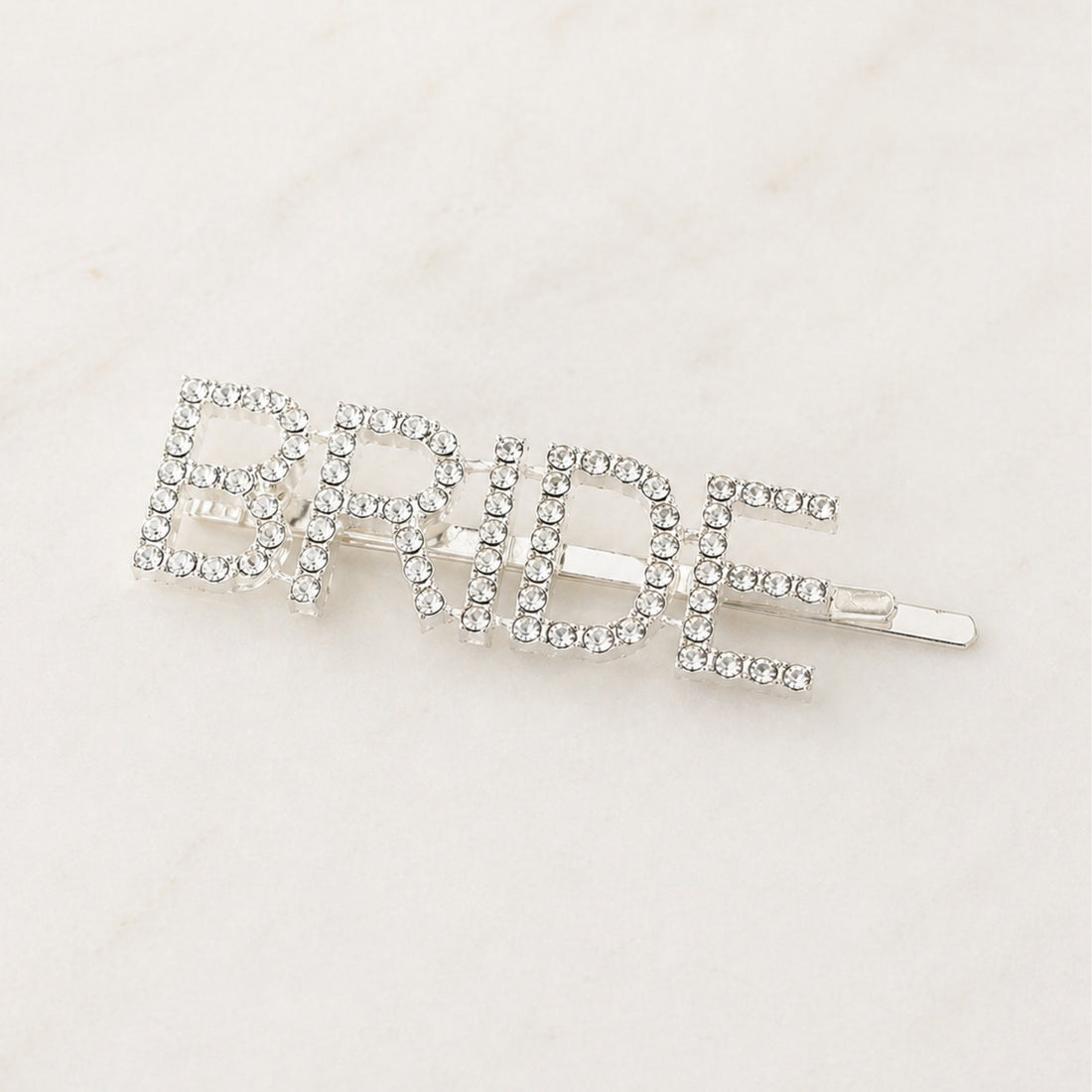 Bride Rhinestone Hair Clip: A sparkling silver hair accessory adorned with rhinestones, ideal for bridal showers and pre-wedding celebrations, adding elegance and charm to her special day.