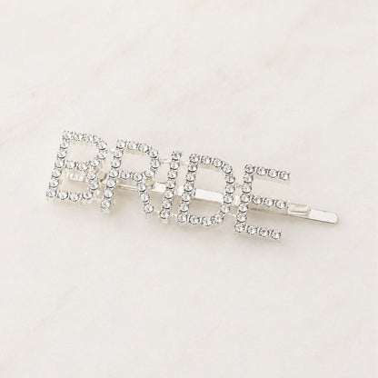 Bride Rhinestone Hair Clip: A sparkling silver hair accessory adorned with rhinestones, ideal for bridal showers and pre-wedding celebrations, adding elegance and charm to her special day.