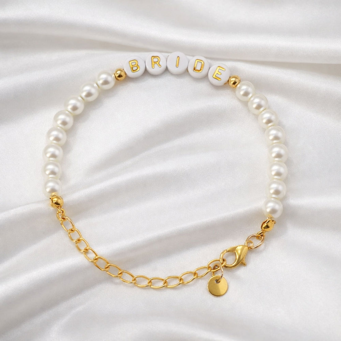 Bride Gold and Pearl Beaded Bracelet featuring glossy faux pearls and gold-lettered beads spelling “BRIDE,” perfect for bridal showers and pre-wedding celebrations.