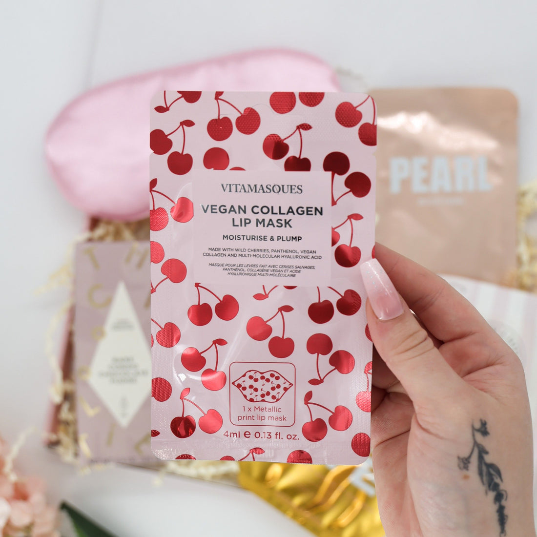 Thoughtful bridesmaid gift – satin mask, sweets and keepsake moment


