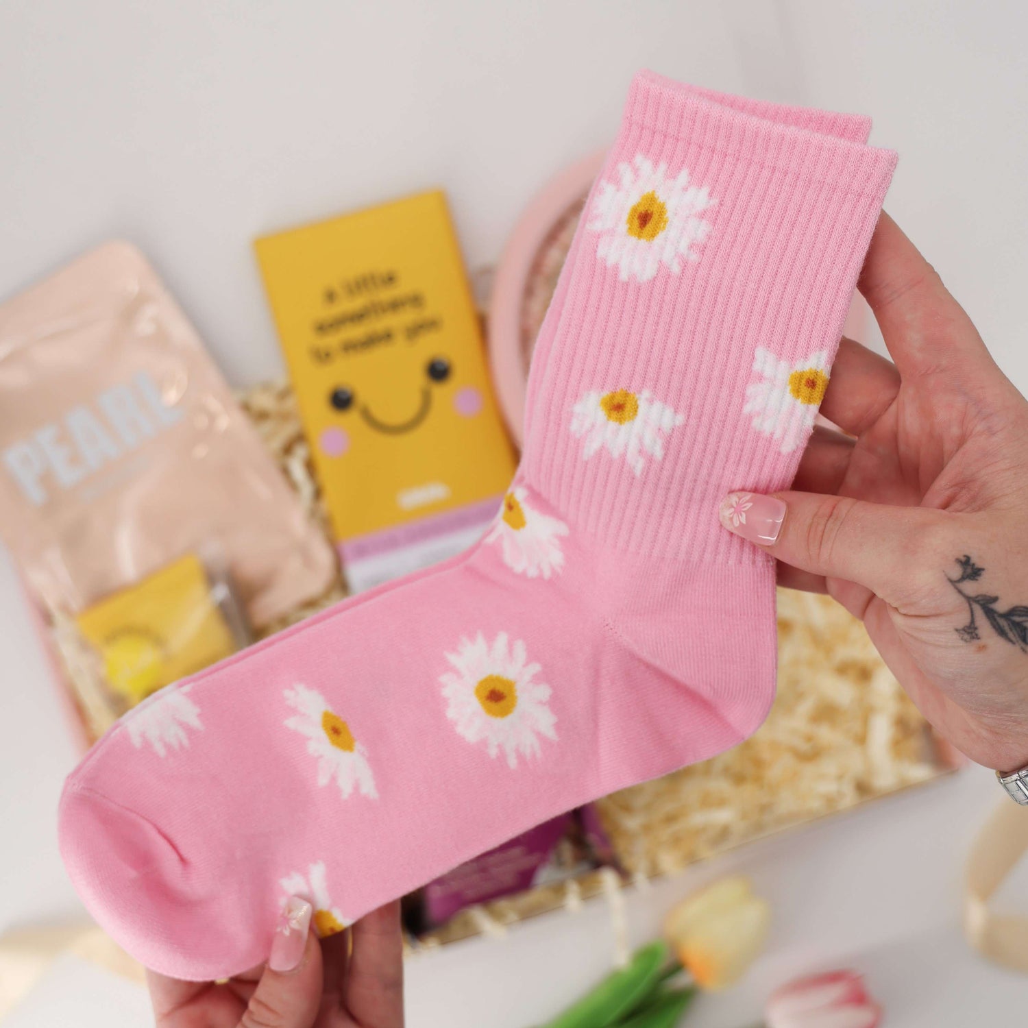 Uplifting pamper box with popcorn, skincare, and cosy treats
