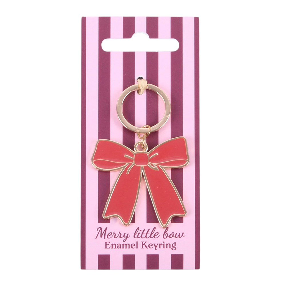 Red enamel bow keyring with gold-toned detailing on pink striped backing card