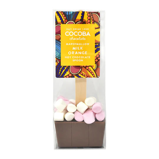 Cocoba Milk Orange Hot Chocolate Spoon with marshmallows, perfect for cozy indulgence or gifting, displayed with chocolate and marshmallow packages.