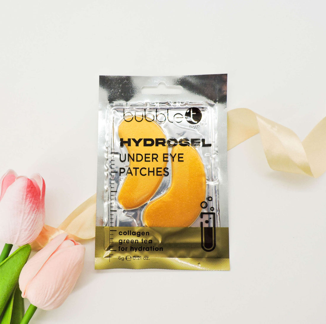 Collagen Hydrogel Eye Patches showcased with floral and ribbon accents, highlighting their hydrating, firming qualities for smoothing fine lines and refreshing tired eyes.