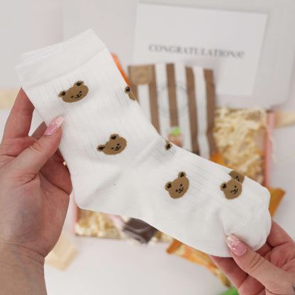 Cosy congratulatory gift set – butterscotch popcorn, face mask, and gummies
