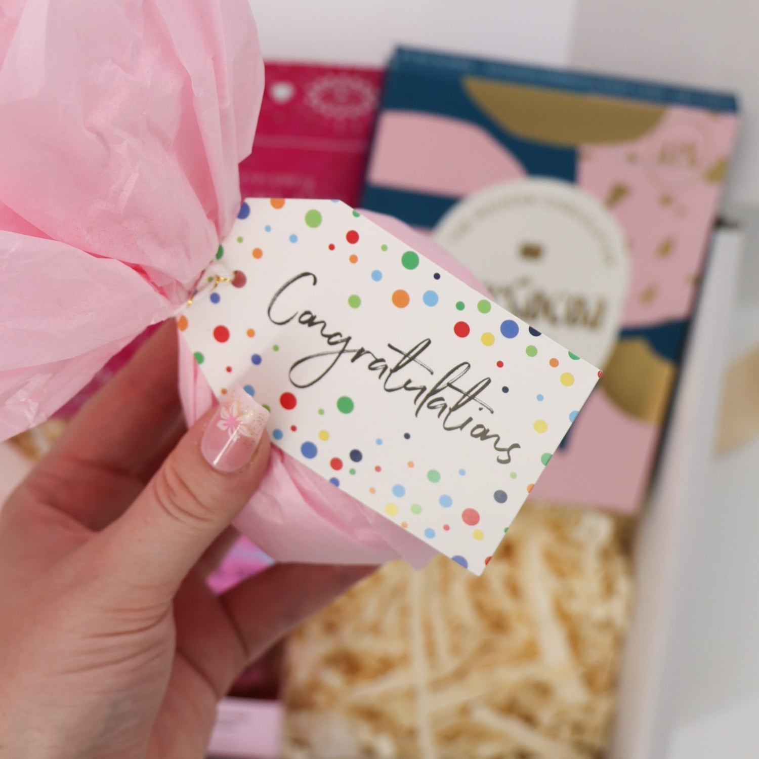 Gift box with facial serum, Love Cocoa chocolate, and keepsake card