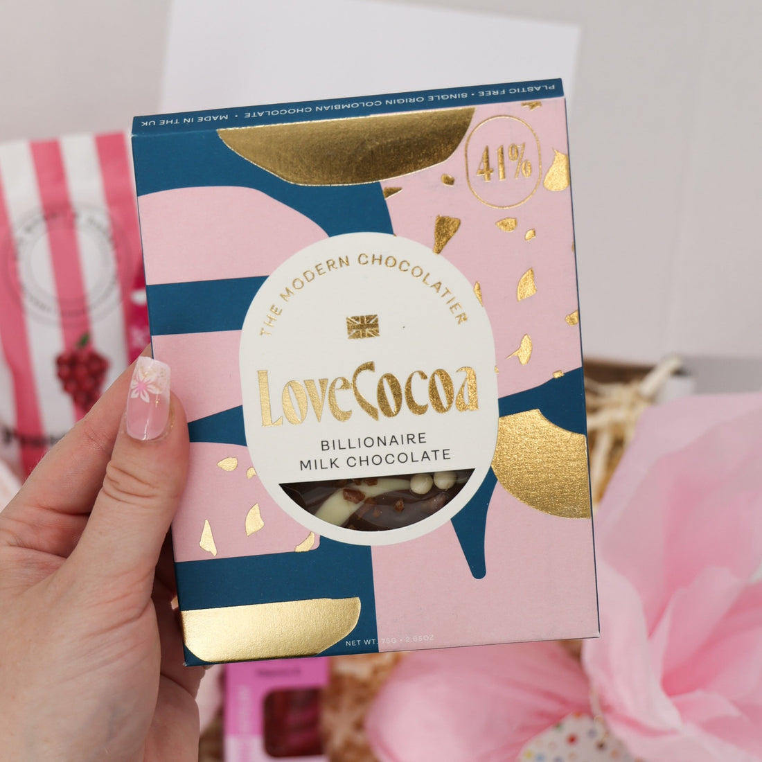 Pamper gift box with prosecco gummies, chocolate, and pink headband