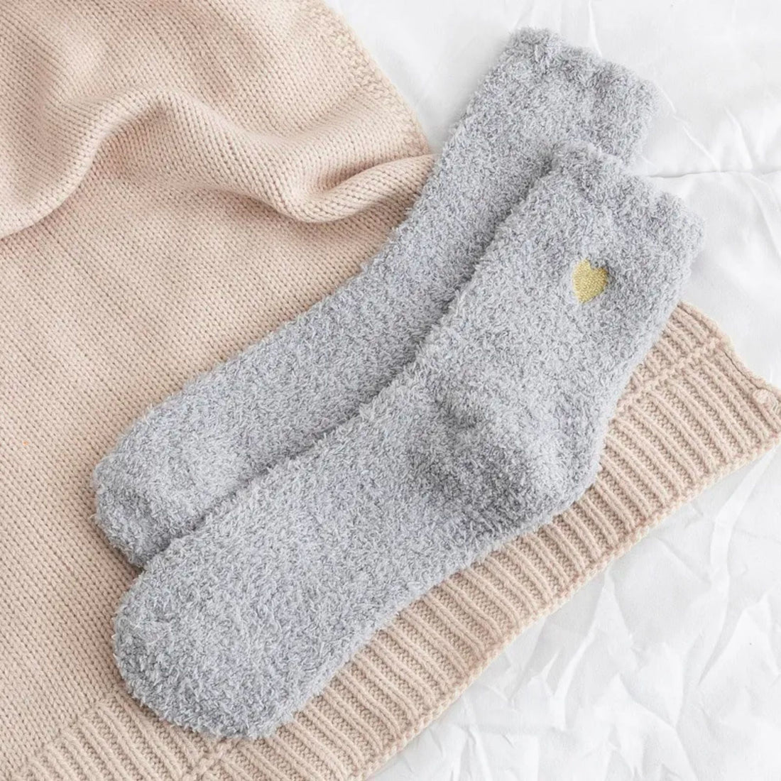 Cosy Heart Print Socks - Grey, featuring fluffy texture and subtle gold heart details, perfect for warmth and comfort at home or as a heartfelt gift.