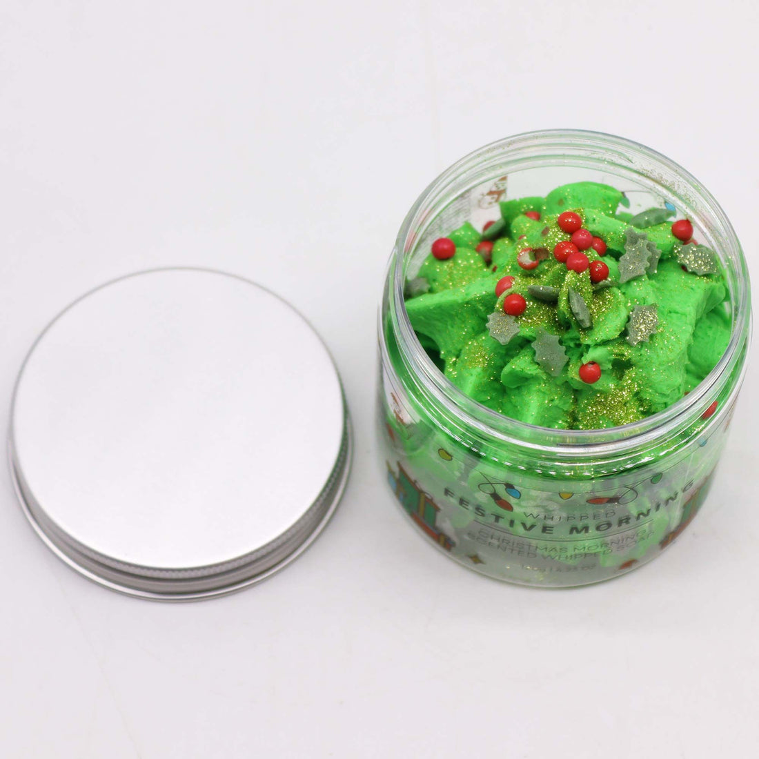 Festive Morning Scented Whipped Soap in a mason jar, showcasing its luxurious texture with sugar Christmas tree decorations, perfect for holiday pampering and moisture.