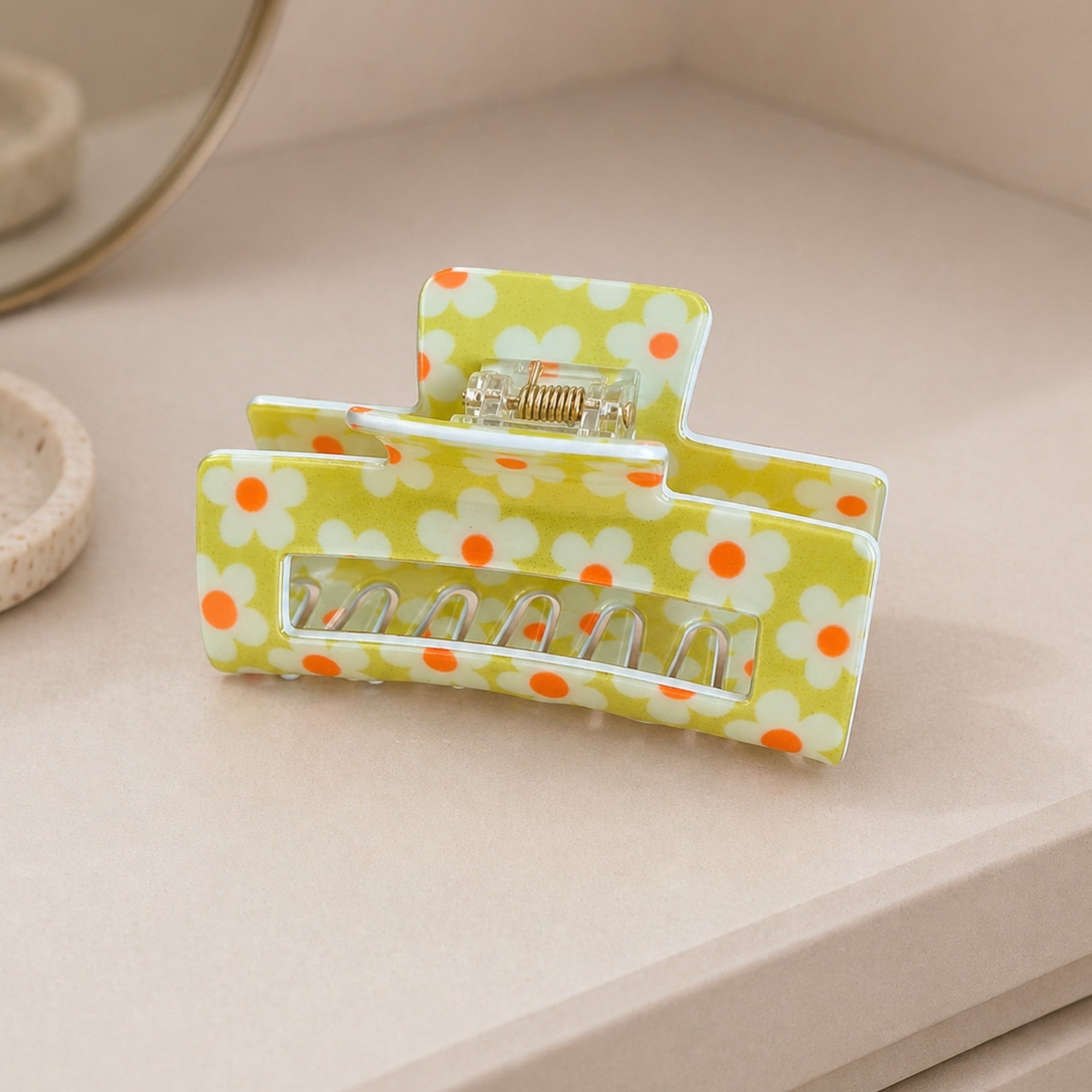 Chartreuse Floral Print Hair Clip showcasing vibrant floral patterns with a sturdy grip, ideal for adding color to any hairstyle.