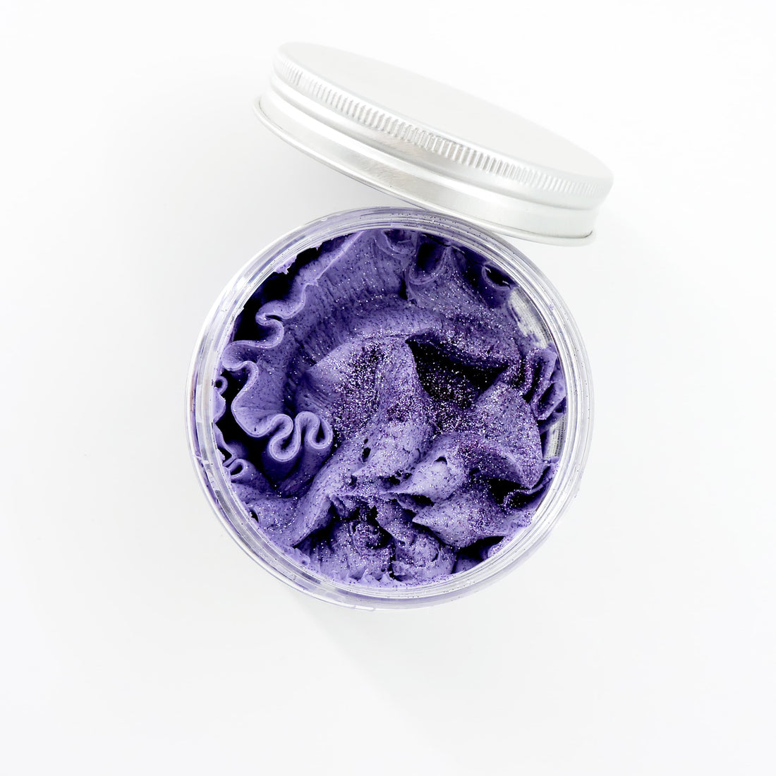 Frosted Sugar Plum Whipped Soap in a jar, showcasing its creamy texture, ideal for a nourishing, candy-scented cleanse.
