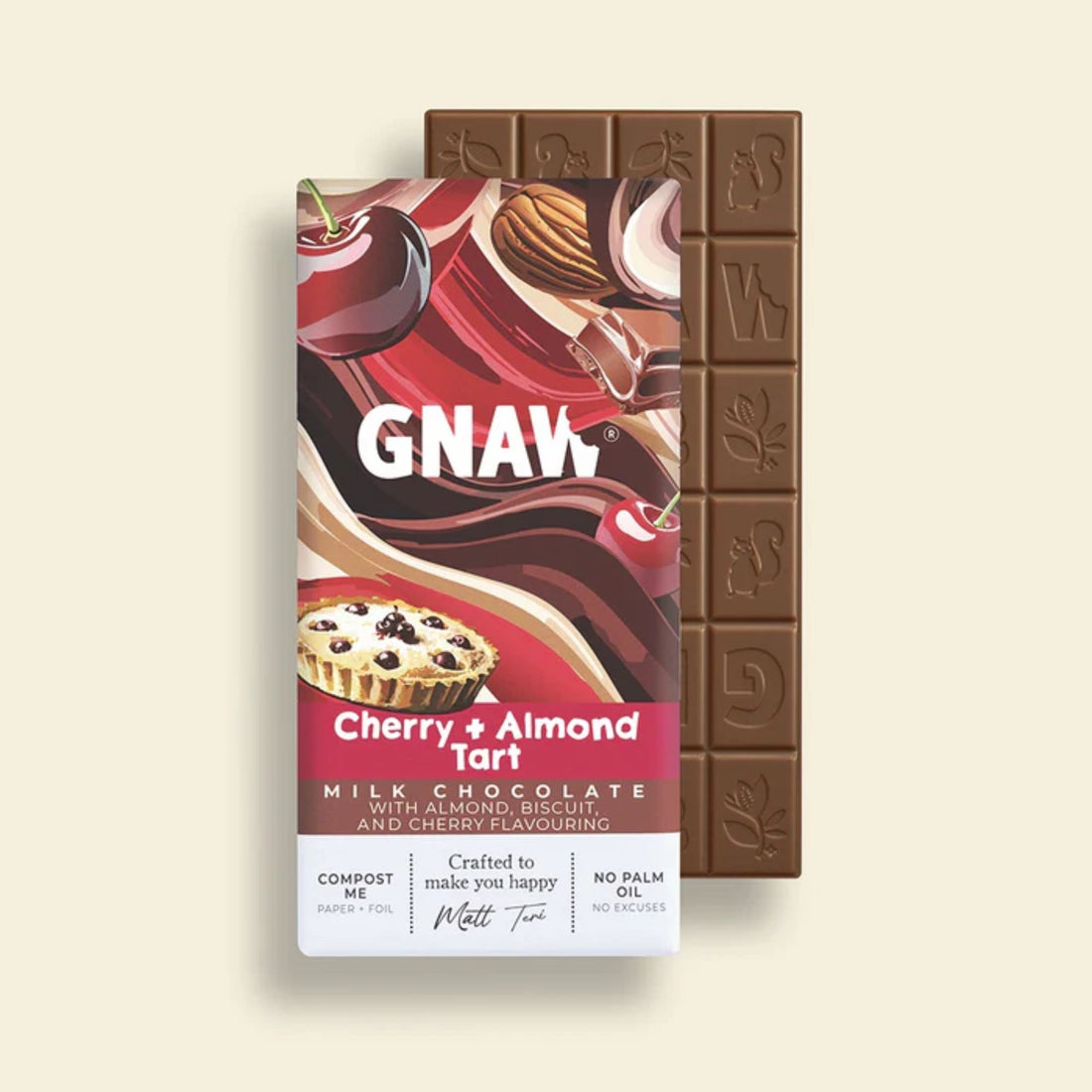 Chocolate bar with cherry and almond flavor packaging on a beige background